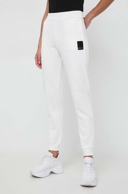 Armani Exchange spodnie dresowe bawełniane kolor beżowy gładkie 3DYP91 YJFDZ