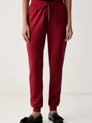 Armani Exchange spodnie dresowe damskie czerwony