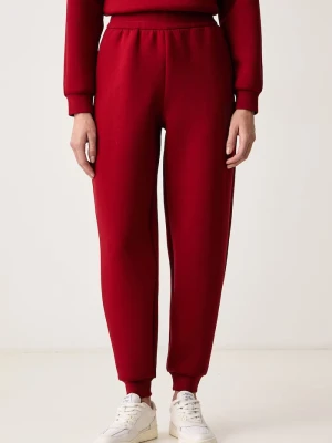 Armani Exchange spodnie dresowe damskie czerwony