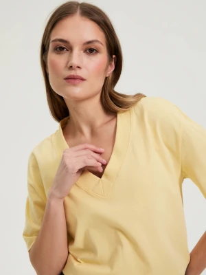 Bawełniana bluzka z dekoltem w serek żółta Moodo