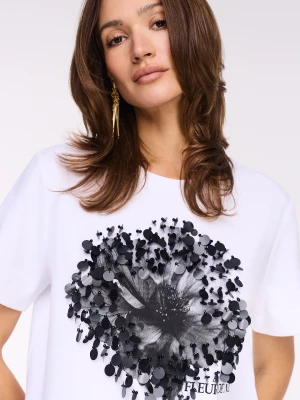 Bawełniana bluzka z kobiecym kwiatem z cekinów TARANKO