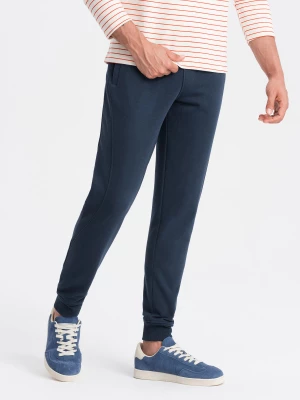 Bawełniane męskie spodnie dresowe joggery BASIC – granatowe V1 OM-PABS-0174
 -                                    S Ombre