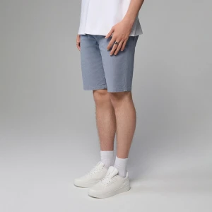 Bawełniane niebieskie szorty z kieszeniami chino House