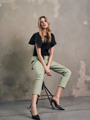 Bawełniane spodnie jeansowe damskie zielone Moodo