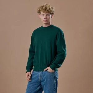 Bawełniany ciemnozielony sweter z okrągłym dekoltem House