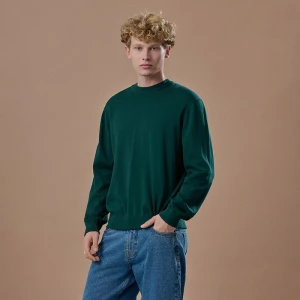 Bawełniany ciemnozielony sweter z okrągłym dekoltem House