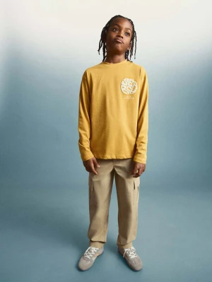 Zdjęcie produktu Bawełniany wzorzysty t-shirt ochra - Dzieci - lata - MANGO KIDS