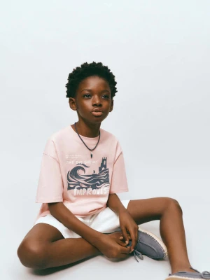 Zdjęcie produktu Bawełniany wzorzysty t-shirt różowy - Dzieci - lata - MANGO KIDS
