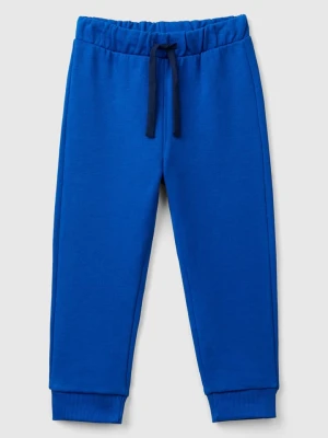 Benetton Spodnie dresowe w kolorze niebieskim rozmiar: 82