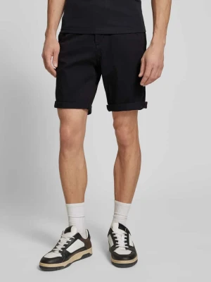Bermudy o kroju regular fit z wpuszczanymi kieszeniami model ‘IBOWIE’ jack & jones