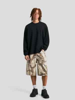 Bershka Bermudy O Kroju Baggy Z Nadrukiem Mężczyzna Zielony