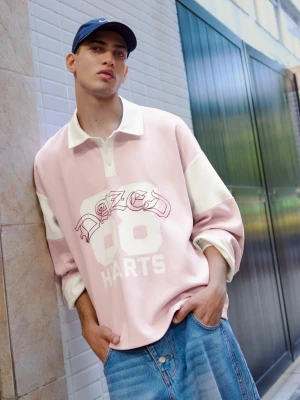 Bershka Bluza Polo Z Długim Rękawem I Nadrukiem Mężczyzna Różowy