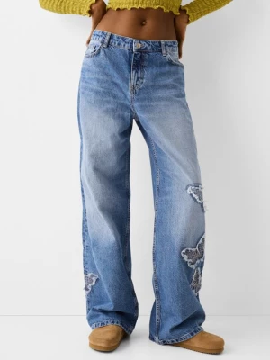 Bershka Jeansy Baggy Z Motywem Motyli Kobieta Wyblakły Niebieski