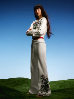 Bershka Jeansy Flare Ed Hardy X Bershka Kobieta Biały Złamany