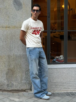 Bershka Jeansy O Kroju Baggy Flare Mężczyzna Wyblakły Niebieski