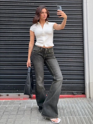 Bershka Jeansy O Kroju Baggy I Flare Kobieta Srebrny