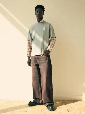 Bershka Jeansy O Kroju Baggy Skater Mężczyzna Brązowy