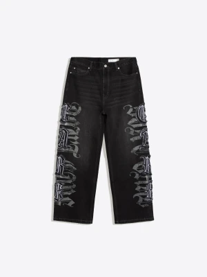 Bershka Jeansy O Kroju Baggy Z Naszywkami W Gwiazdy Mężczyzna Czarny