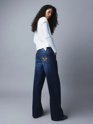 Bershka Jeansy O Kroju Baggy Z Niskim Stanem, Ćwiekami I Gwiazdami Kobieta Niebieski