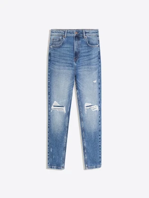 Bershka Jeansy O Kroju Carrot Z Dziurami Mężczyzna Niebieski