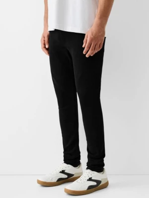 Bershka Jeansy O Kroju Super Skinny Mężczyzna Czarny