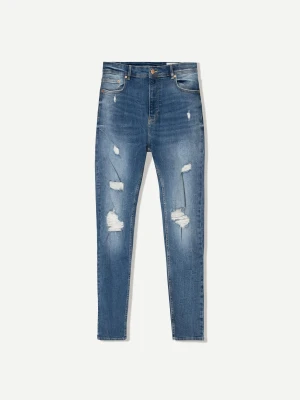 Bershka Jeansy O Kroju Super Skinny Z Efektem Podarcia Mężczyzna Niebieski