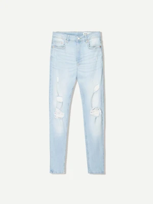 Bershka Jeansy O Kroju Super Skinny Z Efektem Podarcia Mężczyzna Wyblakły Niebieski