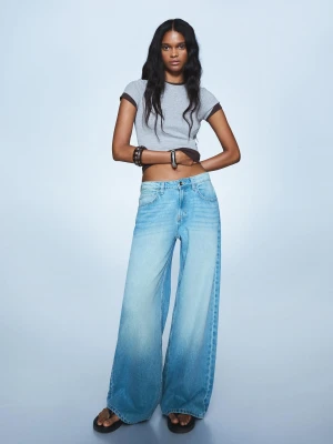 Bershka Jeansy O Kroju Wide Leg Kobieta Wyblakły Niebieski