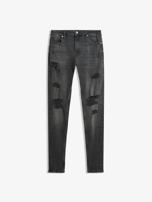 Bershka Jeansy Superskinny Z Dziurami Mężczyzna Czarny