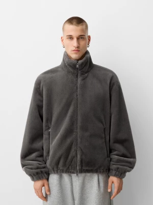 Zdjęcie produktu Bershka Rozpinana Kurtka Ze Sztucznego Futerka Z Wysokim Kołnierzem Mężczyzna Ciemnoszary