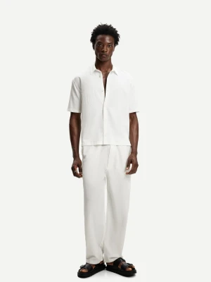 Bershka Plisowane Spodnie Jogger Baggy Mężczyzna Biały Złamany