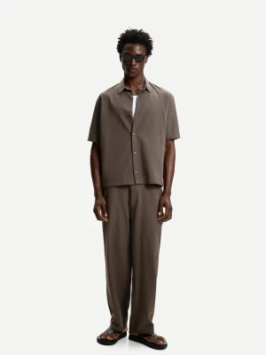 Bershka Plisowane Spodnie Jogger Baggy Mężczyzna Ciemnobeżowy