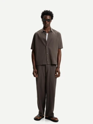 Bershka Plisowane Spodnie Jogger Baggy Mężczyzna Ciemnobeżowy