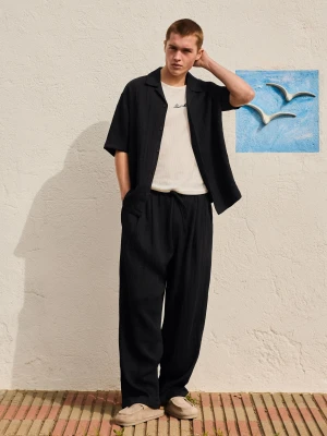 Bershka Spodnie Baggy Rustykalne Mężczyzna Czarny