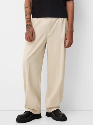 Bershka Spodnie Baggy Tailoring Mężczyzna Piaskowy