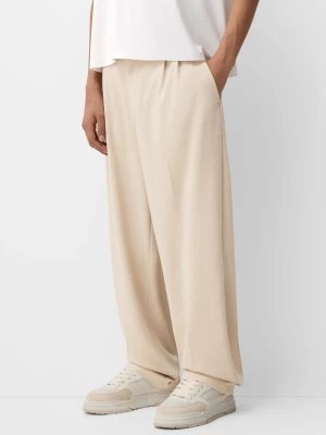 Bershka Spodnie Baggy Tailoring Mężczyzna Piaskowy