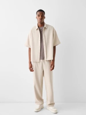 Bershka Spodnie Jogger Mężczyzna Piaskowy