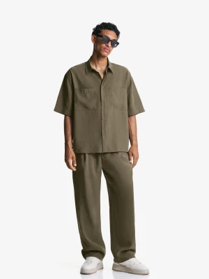 Bershka Spodnie Jogger O Kroju Baggy Mężczyzna Khaki