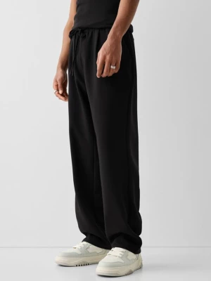 Bershka Spodnie Jogger Wide Leg Z Zakładkami Mężczyzna Czarny