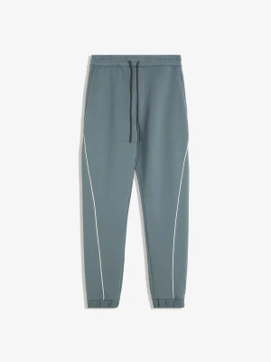 Bershka Spodnie Jogger Z Dzianiny Dresowej Mężczyzna Niebieski