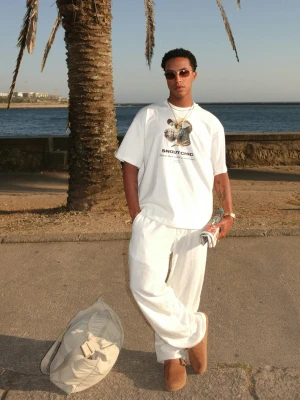 Bershka Spodnie Jogger Z Mieszanki Lnu Z Szerokimi Nogawkami Mężczyzna Biały