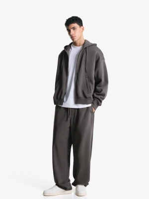 Bershka Spodnie O Kroju Balloon Mężczyzna Szary