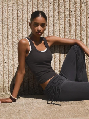 Bershka Spodnie O Kroju Flare Soft Z Modalu Z Marszczeniem I Kokardą Kobieta Ciemnoszary