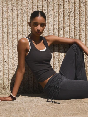 Bershka Spodnie O Kroju Flare Soft Z Modalu Z Marszczeniem I Kokardą Kobieta Ciemnoszary