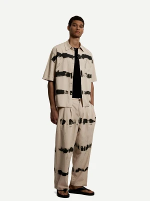 Bershka Spodnie O Kroju Super Baggy Tie Dye Mężczyzna Beżowy