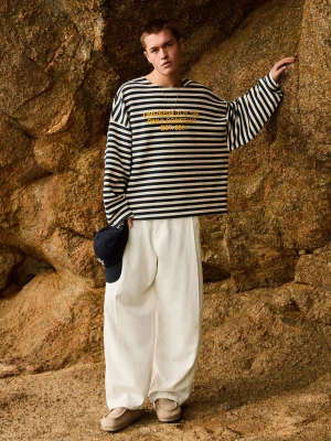 Bershka Spodnie O Kroju Super Baggy Z Lnem Mężczyzna Biały Złamany