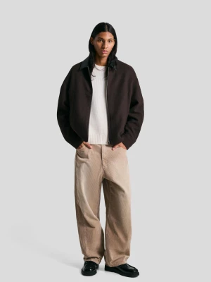 Bershka Spodnie O Kroju Super Baggy Z Sztruksu Mężczyzna Piaskowy