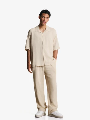 Bershka Spodnie O Kroju Wide Leg Z Krepy Mężczyzna Piaskowy