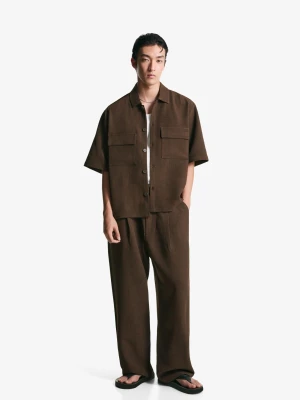 Bershka Spodnie Superbaggy Tailoring Mężczyzna Brązowy