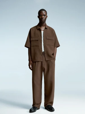 Bershka Spodnie Superbaggy Tailoring Mężczyzna Brązowy